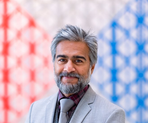 A photo of Rafiq Ajani with the AKC background 