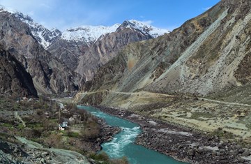 A bird eye view of Panj river with mountains on the side
