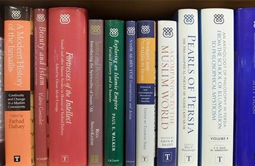 A set of IIS publications lying on a shelf
