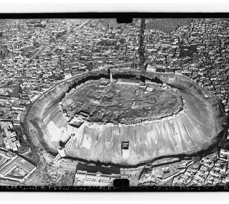 A black and white image showing a bird eye view of a round city