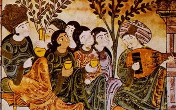 A group of people sitting together and enjoying music