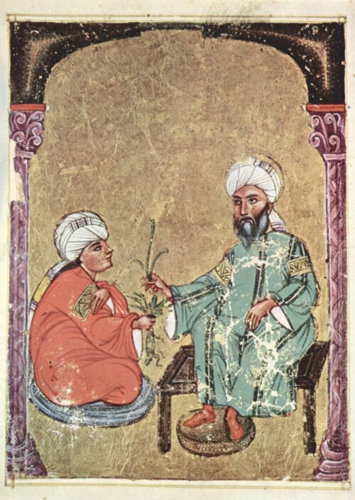 Two individuals dressed in Arab clothes , one on the table, one on the cushion talking and sharing something with each other