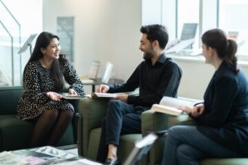 GPISH students talking in library