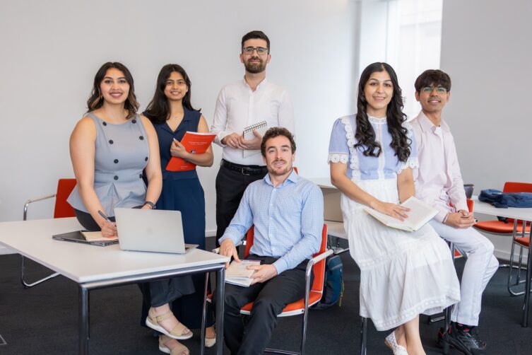 STEP C18 students pictured together in a classroom setting.