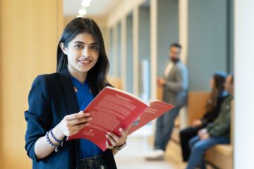 Step Student holding a book