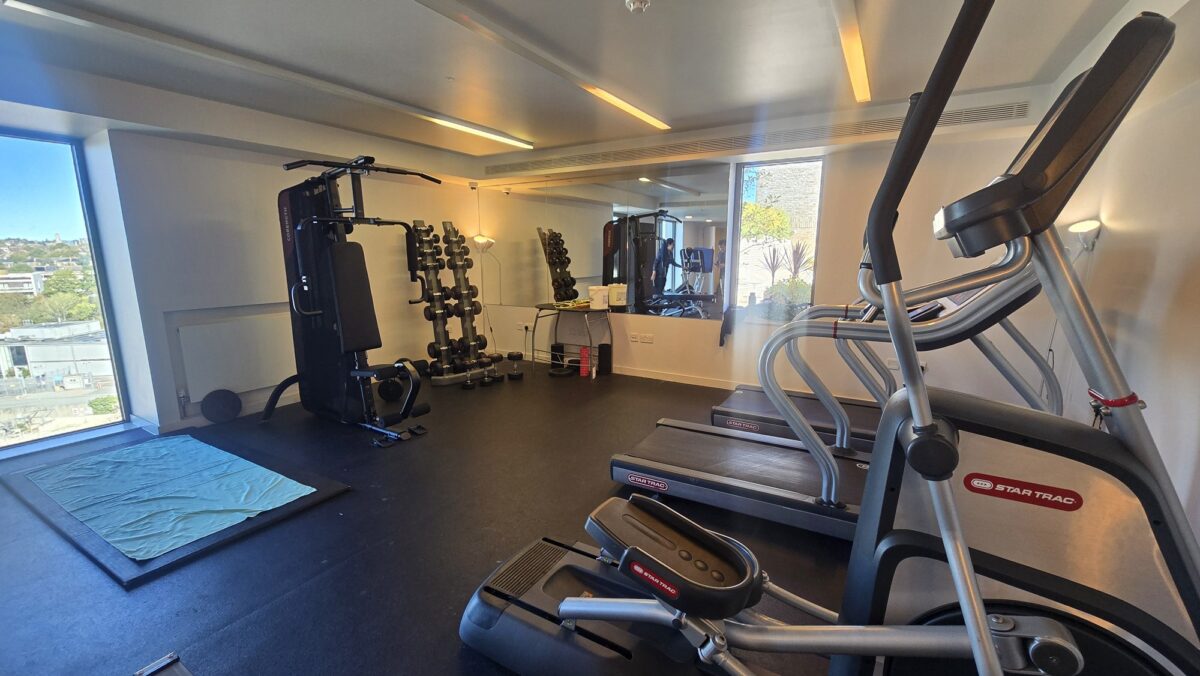 Fitness room at Victoria Hall with two treadmills, a cross-trainer, a rowing machine and a multi-gym.