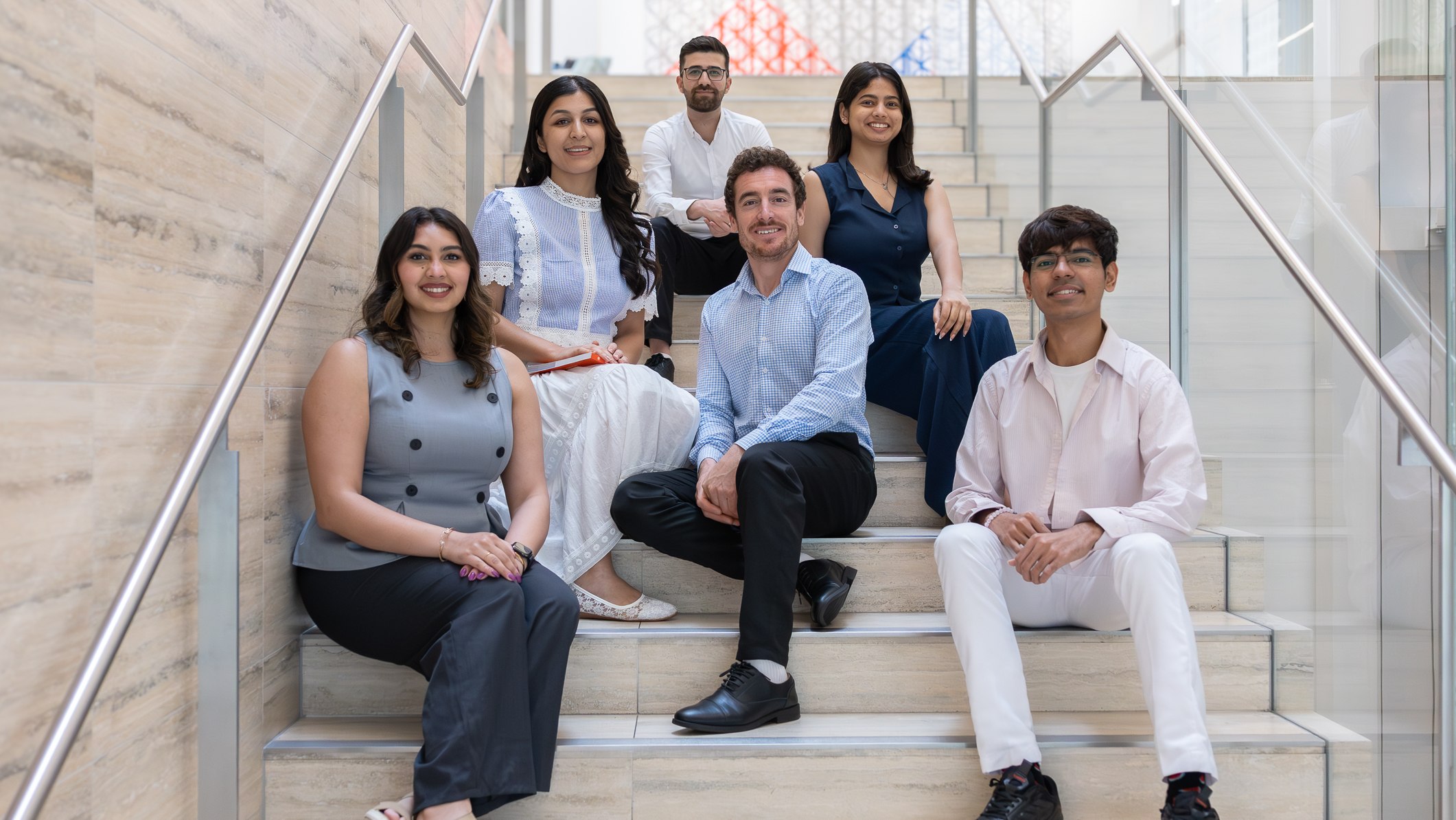 STEP students on the stairs of the Aga Khan Centre.