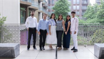 Six STEP Cohort 18 students standing together on the first-floor garden terrace at the Aga Khan Centre.