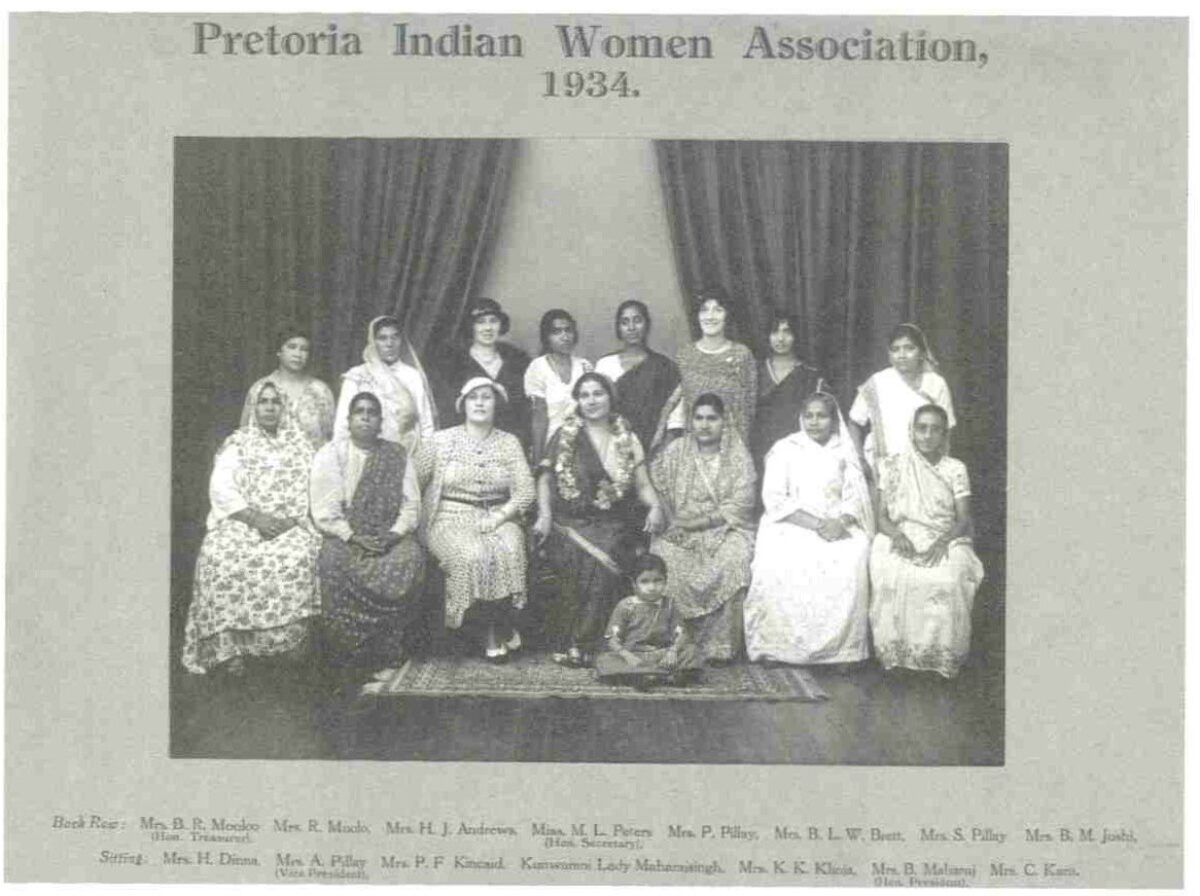 a group of women posing for a photo