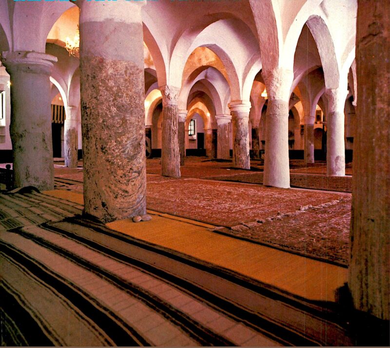 Interior of Al-Naqah Mosque, showing the diverse hypostyle columns.