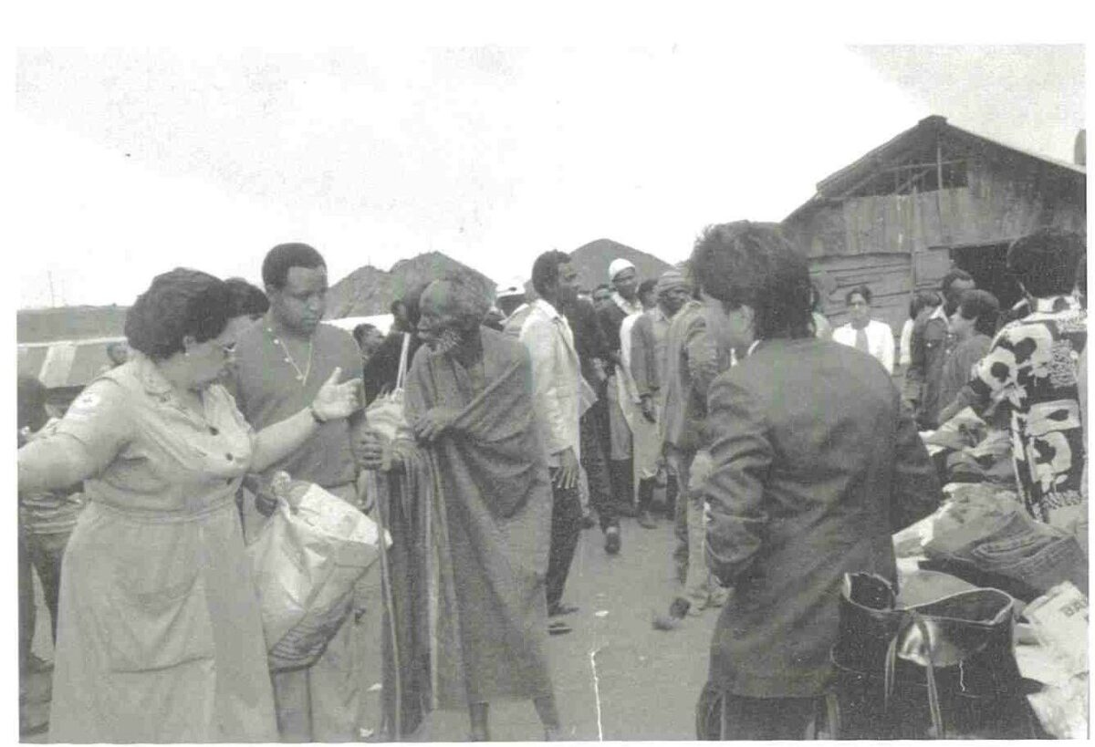 a group of people standing outside