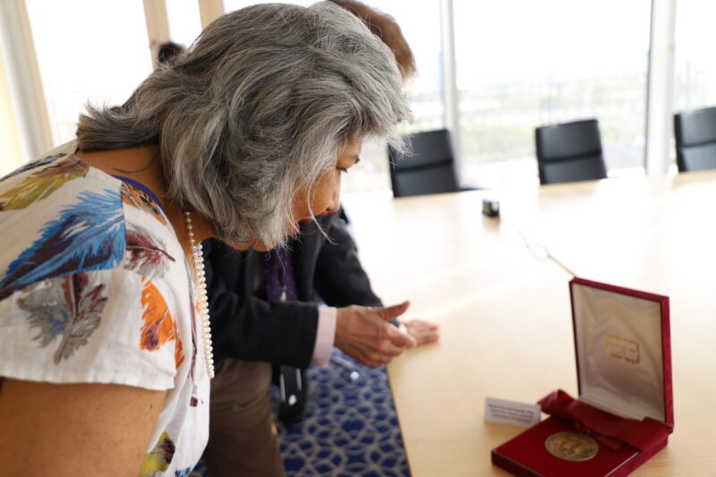 Professor Kassam and Dr Keshavjee observing the Gandhi King Ikeda Medal