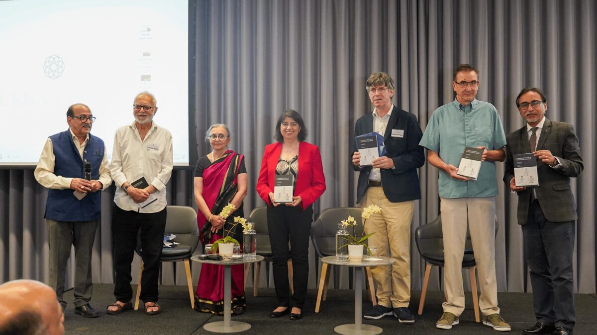 Group of speakers at an event.
