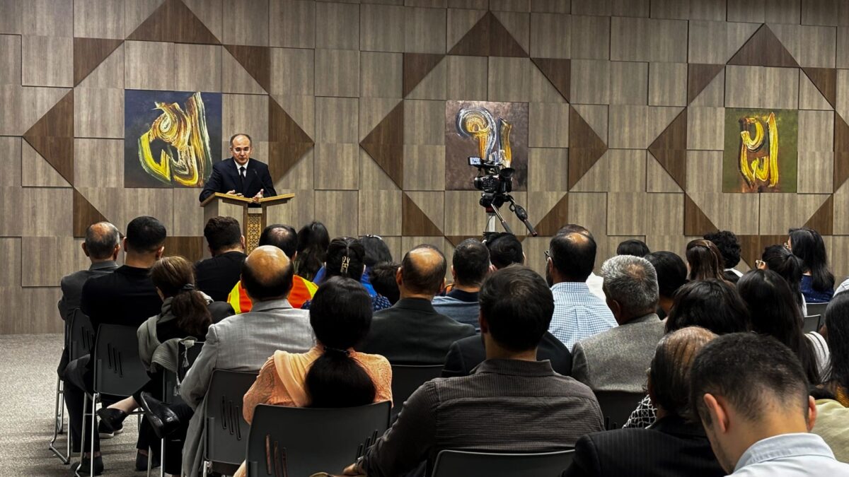IIS scholar addressing a community audience during a United States visit