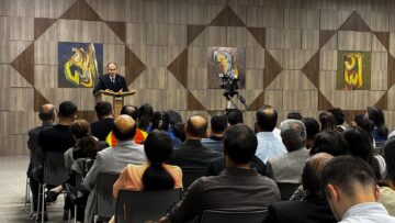 IIS scholar addressing a community audience during a United States visit