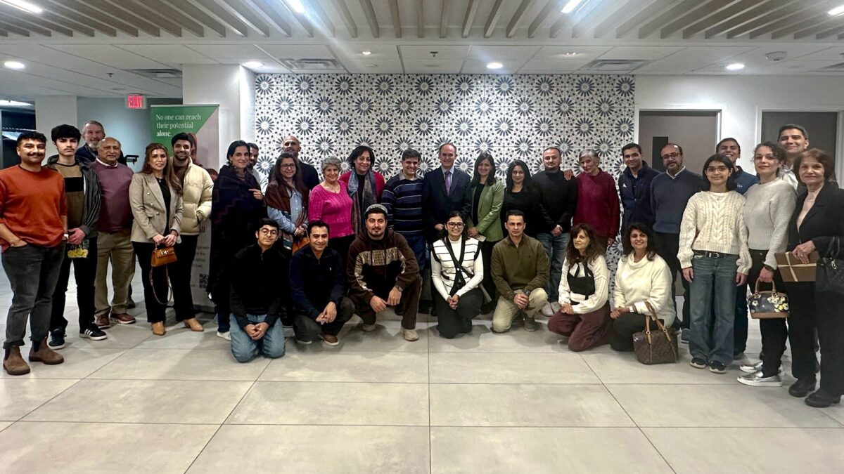 IIS scholar with families and community members during a US visit