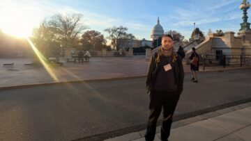 An IIS scholar stands outdoors near the United States Capitol building during an international academic conference. The image relates to research engagement on Fatimid Sicily and Mediterranean history.