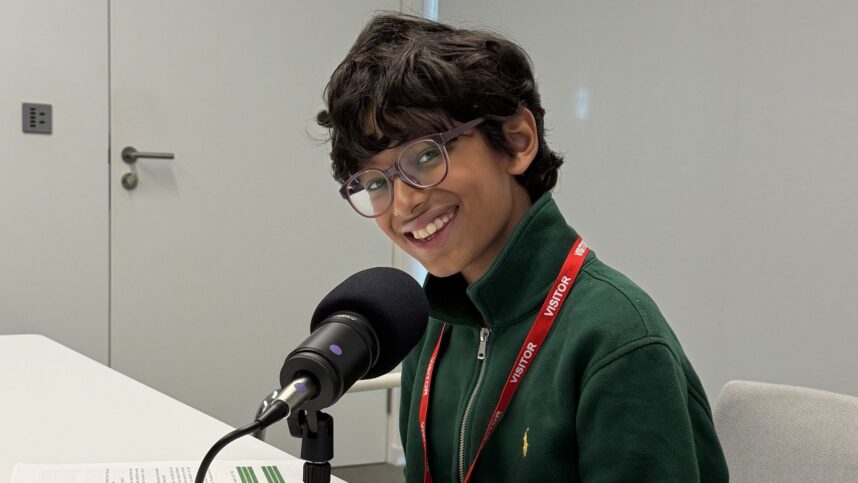 Portrait of podcast host Murtaza recording in a studio