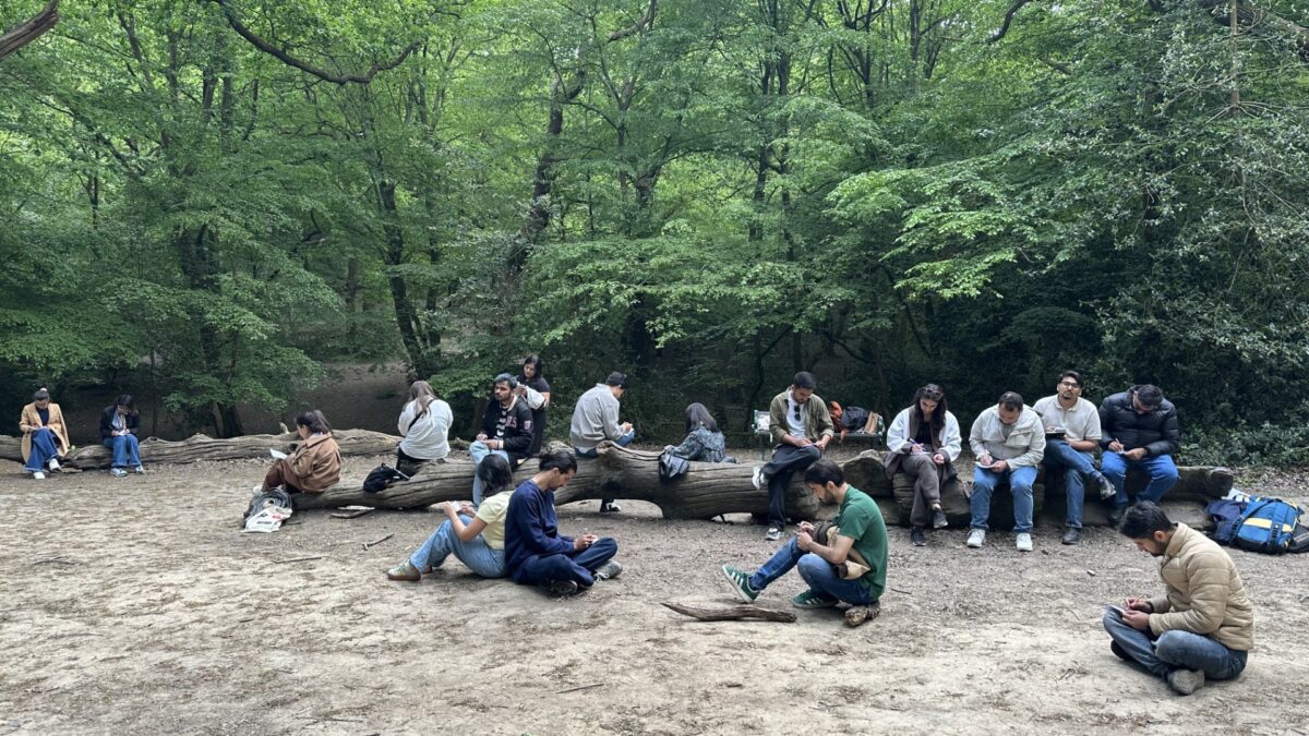 STEP student-teachers writing poetry and reflections during workshop at Queen's Wood in North London.