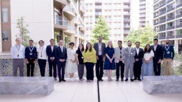 Speakers and participants posing in the first floor garden at the Aga Khan Centre during Digital Futures conference.