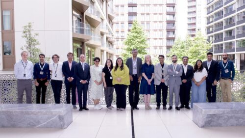 Speakers and participants posing in the first floor garden at the Aga Khan Centre during Digital Futures conference.