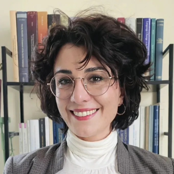 Mara Nicosia smiling in a headshot photograph.